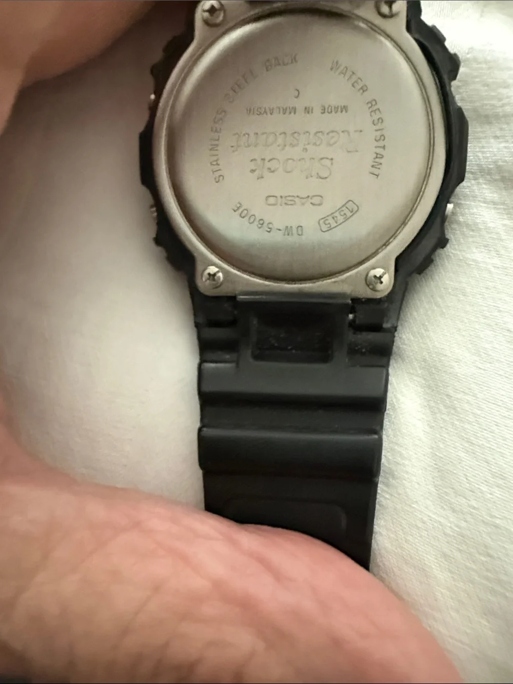 Black Casio illuminater digital watch. G-Shock resistant, waterproof.